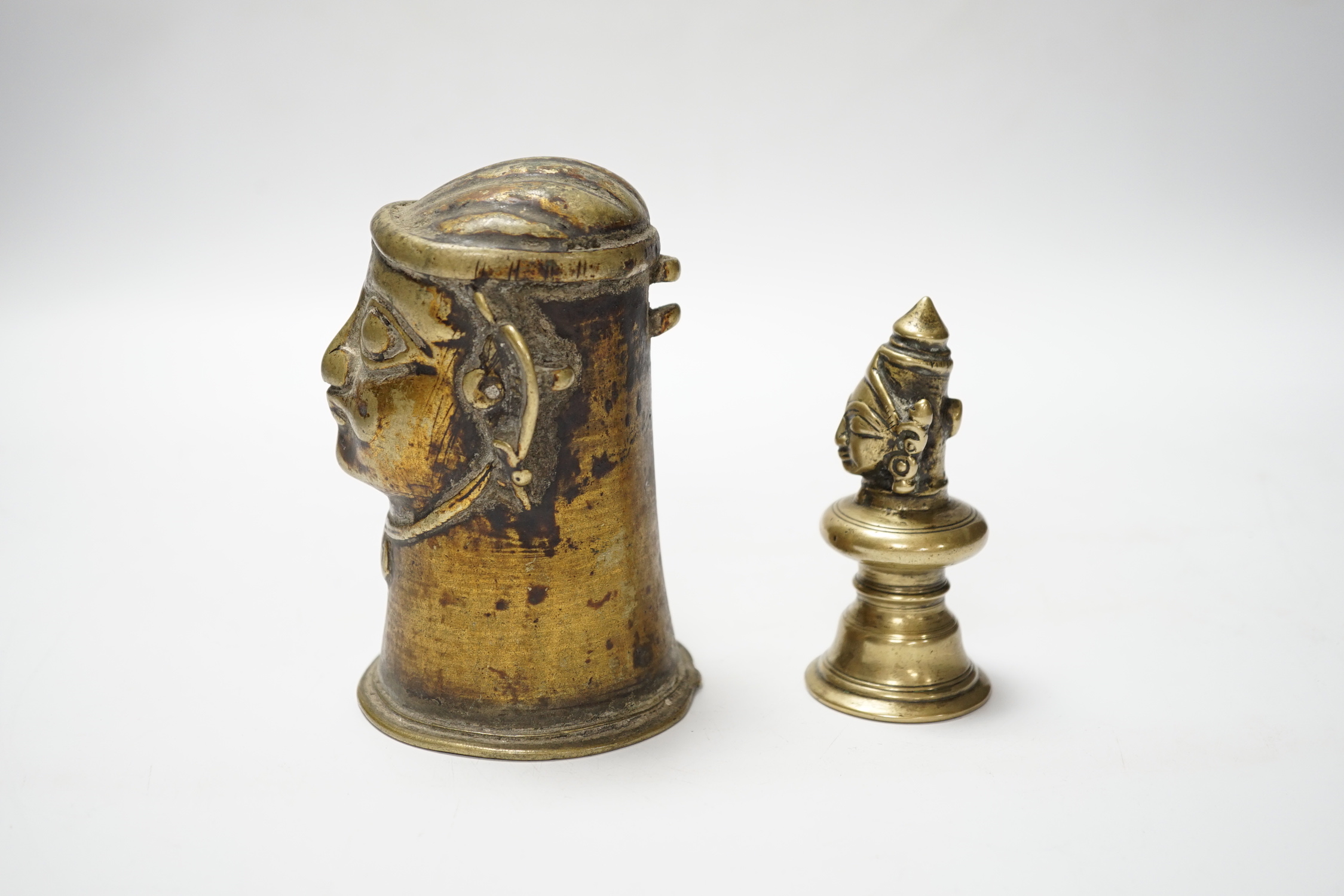 Two brass alloy Shiva Mukhalingam, Southern India, 16th-18th century